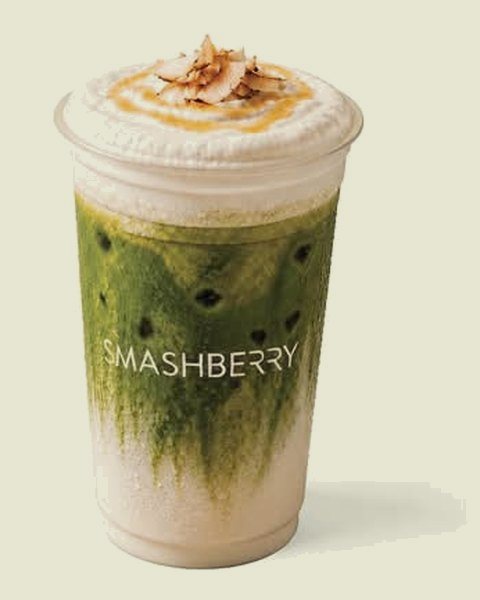 Coconut Honey iced matcha latte: milk, matcha and golden foam.